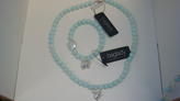 Baglady halsband, ljusturkos 349:- armband 299:-