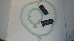Baglady halsband, ljusturkos 349:- armband 299:-