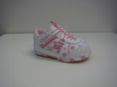 Vit skinnsko med rosa blommor Skechers