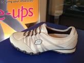 Skechers sköna skor i beige skinn, med resår istället för snörning